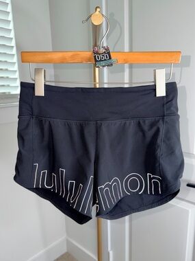 50. Lululemon Speed Up Mid-Rise Lined Short 4" *Graphic Black/PANTONE 8042 C